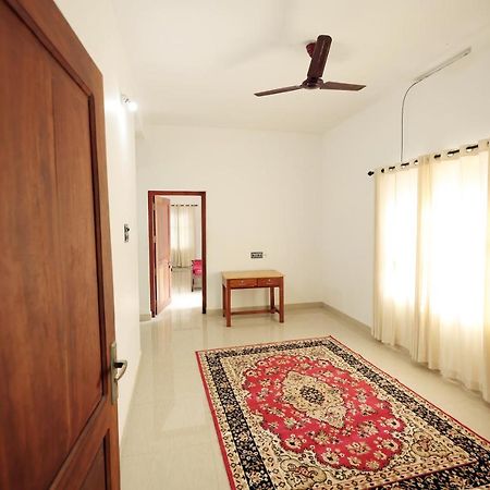 Daffodil Rooms - Non Ac Tellicherry Esterno foto